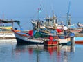 Colorful fishing boats anchored in Paracas Bay, Peru