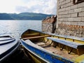 Colorful fishing boats in lakeside village Lin, Albania, Lake Ohrid in the background.