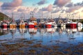 Commercial fishing boats in a Harbour with cloudy sky Royalty Free Stock Photo