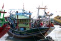 Fishing boat at the harbor dock in the afternoon Royalty Free Stock Photo