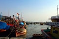 Fishing boat at the harbor dock in the afternoon Royalty Free Stock Photo