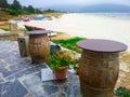 Colorful fishing boats and old barrels in Galicia, Spain Royalty Free Stock Photo