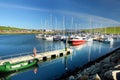 Colorful fishing boats and yachts at the harbor of Dingle town on the West Atlantic coast of Ireland. Towns and villages on famous Royalty Free Stock Photo