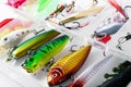 Colorful fishing lures and baits in box