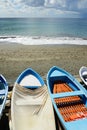 Colorful fishing wooden boat moored on the beach Royalty Free Stock Photo