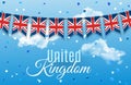 Colorful flag garlands of Great Britain, United Kingdom with confetti on blue sky with clouds background. Festive Royalty Free Stock Photo