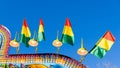 Colorful flags and lights at an amusement park