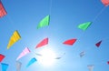Colorful flags on the sky and sunlight background, flags line fancy, colorful flag line and wind sky, festival flag lines on sky Royalty Free Stock Photo
