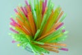 Colorful flexible drinking straws for parties in glass