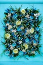 Colorful flower arrangement of blue roses and other flowers Royalty Free Stock Photo