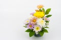 Colorful flower bouquet arrangement in vase isolated on white Royalty Free Stock Photo