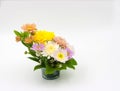 Colorful flower bouquet arrangement in vase isolated on white Royalty Free Stock Photo