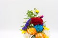 Colorful flower bouquet arrangement in vase on white ba Royalty Free Stock Photo
