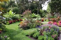 Colorful flowerbeds and immaculate lawn