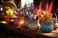 Colorful flowering herbs in wicker vases beside wooden looms on a table background, palm sunday crafts picture