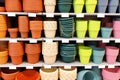 Colorful flowerpots in the florist store. Hardware store Royalty Free Stock Photo