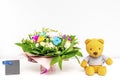 Colorful flowers bouquet composition.Beautiful tenderness flowers,teddy bear,gift box.Spring floral romantic mockup