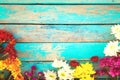 Colorful flowers bouquet on vintage wooden background Royalty Free Stock Photo