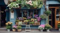 Colorful flowers in front of a flower shop in an old European town on a spring day. Royalty Free Stock Photo