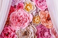 Colorful flowers paper background. Red, pink, purple, brown, yellow and peach handmade paper roses Royalty Free Stock Photo