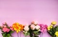 Colorful flowers on a pink backgroundi. Place for text. Festive background. Event. The concept. Flat lay. Top view Royalty Free Stock Photo