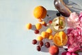 Colorful flowers of pink peony on a wooden table, summer drinks and various fruits, top view with copy space, selective focus Royalty Free Stock Photo