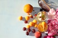 Colorful flowers of pink peony on a wooden table, summer drinks and various fruits, top view with copy space, selective focus Royalty Free Stock Photo