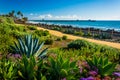 Colorful flowers and view of the fishing pier at Linda Lane Park Royalty Free Stock Photo