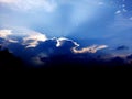 Colorful fluffy clouds in blue sky. blue sky with clouds and sun reflection.The sun shines bright in Royalty Free Stock Photo