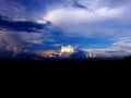 Colorful fluffy clouds in blue sky. blue sky with clouds and sun reflection.The sun shines bright in Royalty Free Stock Photo