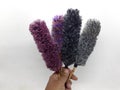 Colorful Fluffy Cute Feather Duster Synthetic Fabric Materials for Home Interior Cleaning Tools in White Isolated Background Royalty Free Stock Photo