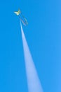 Colorful flying kite in the blue sky Royalty Free Stock Photo