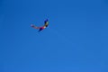 Colorful flying kite fly in the blue sky Royalty Free Stock Photo