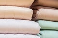 Colorful folded blanket stack closeup picture
