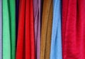 Colorful folded textile and fabric texturs in a close up view