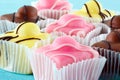 Colorful little fondant cakes. Royalty Free Stock Photo