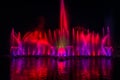 The colorful fountain dancing in celebration of year with dark night sky background. Royalty Free Stock Photo