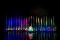 The colorful fountain dancing in celebration of year with dark night sky background. Royalty Free Stock Photo