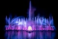 The colorful fountain dancing in celebration of year with dark night sky background. Royalty Free Stock Photo