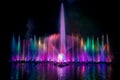 The colorful fountain dancing in celebration of year with dark night sky background. Royalty Free Stock Photo