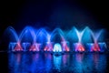 The colorful fountain dancing in celebration of year with dark night sky background. Royalty Free Stock Photo