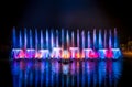 The colorful fountain dancing in celebration of year with dark night sky background. Royalty Free Stock Photo