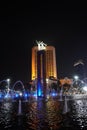 Colorful fountain show at iconic statue of Patung Selamat Datang at Bundaran HI in Jakarta central business district