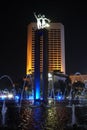 Colorful fountain show at iconic statue of Patung Selamat Datang at Bundaran HI in Jakarta central business district