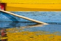 Detail of yellow, blue and red Trajinera boat and its reflection, in Xochimilco, Mexico Royalty Free Stock Photo
