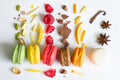 Colorful french macarons abstract still life with fruits and ingredients on white background Royalty Free Stock Photo