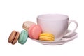 Colorful French Macarons with Cup of Tea isolated