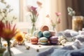 Colorful French macarons on wooden table surrounded with beautiful flowers. Generative AI
