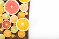 Colorful fresh citrus fruit on wooden background. Orange, tangerine, lime, blood orange, grapefruit. Fruit background. Summer foo Royalty Free Stock Photo