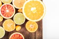 Colorful fresh citrus fruit on wooden background. Orange, tangerine, lime, blood orange, grapefruit. Fruit background. Summer foo Royalty Free Stock Photo